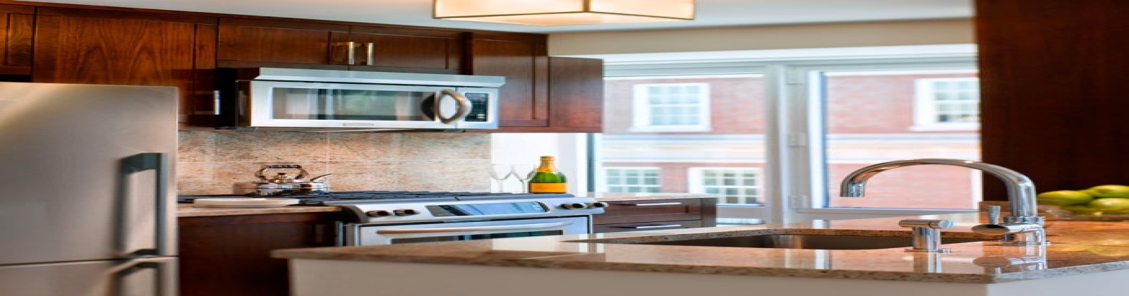 Gourmet Kitchens with Custom Granite, Stainless Steel Appliances