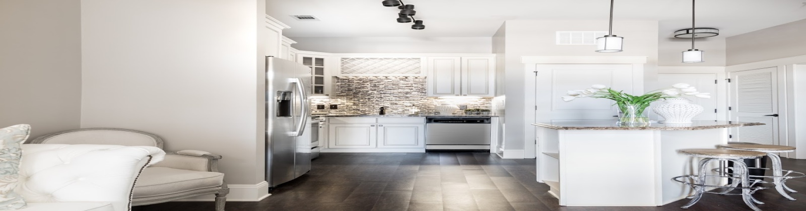 Luxury Plank Flooring, Marble Countertops, Large Islands, Custom Cabinetry, Oil Rubbed Bronze Finishes, Stainless Steel Appliances, Kitchen Pantries