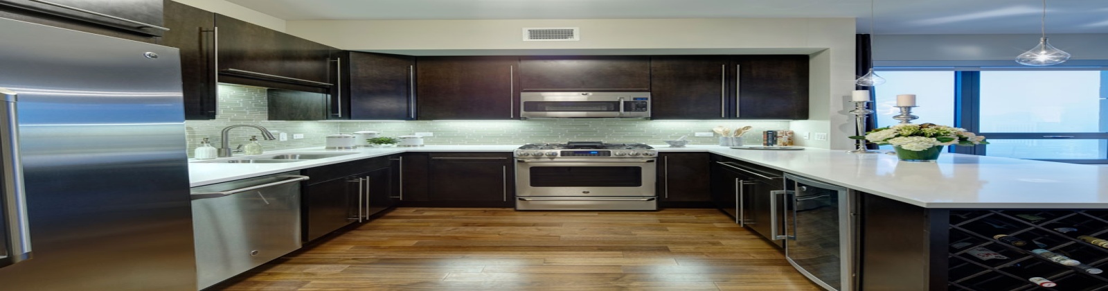 Granite Countertops, Gooseneck Kitchen Faucets, Stainless Steel Appliances