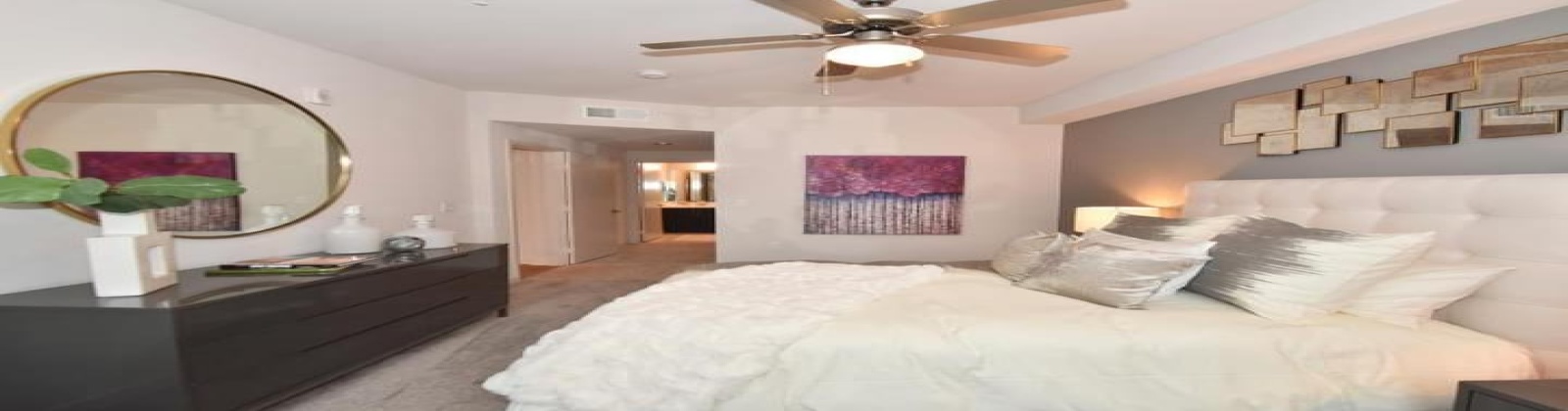 Generous Closet and Linen space, blackout window shades, wood plank style flooring Generous Closet and Linen space, blackout window shades, wood plank style flooring