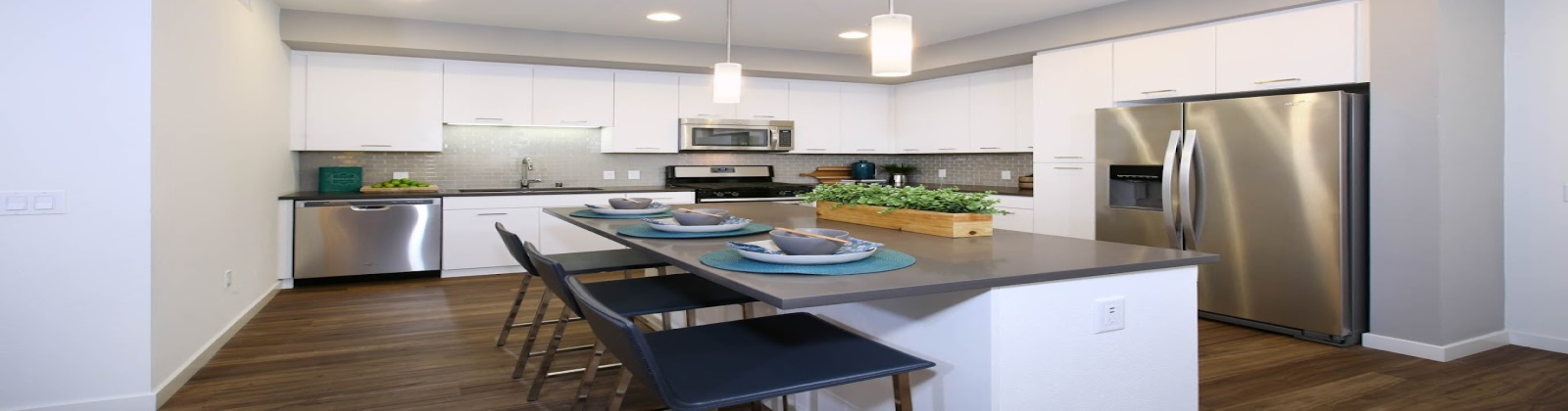 Island Kitchens, hard surface flooring, quartz countertops, subway tile backsplash, stainless steel appliances 