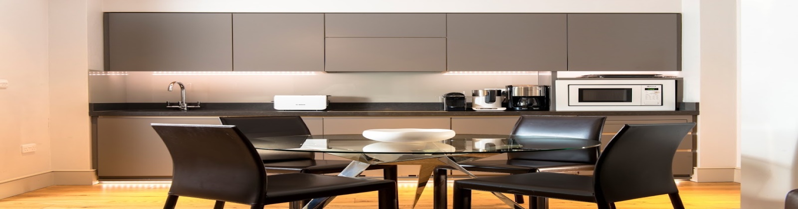 Bespoke finishings, gourmet with granite countertops, stainless steel appliances, 