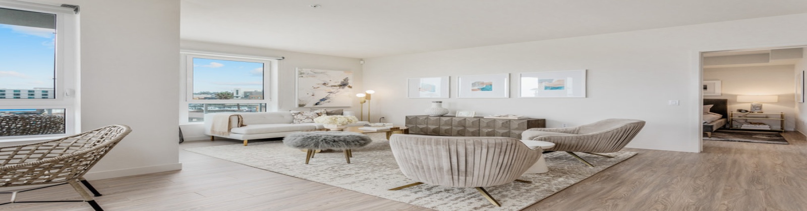 oversized windows, hardwood style flooring