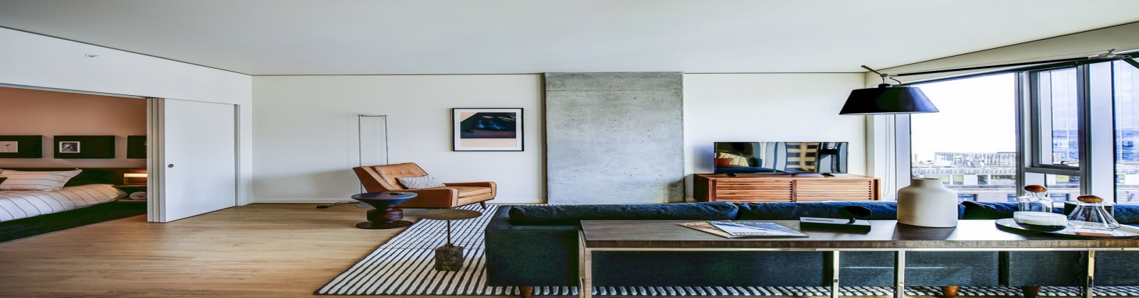 Hard surfaced flooring throughout, floor to ceiling windows 