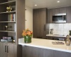 Quartz countertops, Calcutta marble backsplashes, stainless steel appliances, double paned windows 