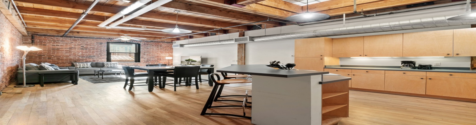 Fully Furnished Modern Loft in Historic Icehouse Building Steps from Union Station, Denver, CO

Discover urban living at its finest in this stunning fully furnished 1-bedroom, 1-bathroom loft in the iconic Icehouse Condominium Building, located in the heart of LoDo (Lower Downtown) Denver next to Union Station. This loft offers the perfect blend of industrial charm and modern comfort with exposed brick walls, wood-beamed ceilings, and a skylight.

The open-concept layout features a spacious living area with stylish furnishings, opening to the kitchen and dining areas and a large island — perfect for entertaining. The bedroom offers ample space, king sleep by number bed and a large walk-in closet, while the bathroom has a shower/tub.  This property also includes in-unit laundry, hardwood floors, and central HVAC.

The Icehouse Building offers top-notch amenities, including a rooftop deck with BBQ area, a fitness center, secure entry, and 1 assigned garage parking space in the rear of the building.

Situated just steps from Union Station, Coors Field, restaurants, breweries, and boutiques, this loft offers the ultimate walkable lifestyle. Whether you’re relocating or looking for a turnkey investment, this property is move-in ready and waiting for you.
