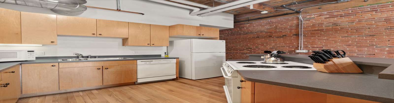 Fully Furnished Modern Loft in Historic Icehouse Building Steps from Union Station, Denver, CO

Discover urban living at its finest in this stunning fully furnished 1-bedroom, 1-bathroom loft in the iconic Icehouse Condominium Building, located in the heart of LoDo (Lower Downtown) Denver next to Union Station. This loft offers the perfect blend of industrial charm and modern comfort with exposed brick walls, wood-beamed ceilings, and a skylight.

The open-concept layout features a spacious living area with stylish furnishings, opening to the kitchen and dining areas and a large island — perfect for entertaining. The bedroom offers ample space, king sleep by number bed and a large walk-in closet, while the bathroom has a shower/tub.  This property also includes in-unit laundry, hardwood floors, and central HVAC.

The Icehouse Building offers top-notch amenities, including a rooftop deck with BBQ area, a fitness center, secure entry, and 1 assigned garage parking space in the rear of the building.

Situated just steps from Union Station, Coors Field, restaurants, breweries, and boutiques, this loft offers the ultimate walkable lifestyle. Whether you’re relocating or looking for a turnkey investment, this property is move-in ready and waiting for you.
