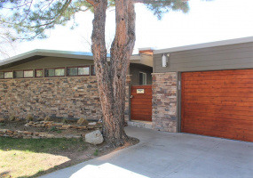 3 Bedroom 3 Bathroom property has amazing views of downtown Denver and is a stone\'s throw away from 6th Avenue. Hardwood floors are featured throughout the main floor, along with granite countertops, stainless steel appliances, enclosed office space, floor-to-ceiling windows, private outdoor space, raised deck, and 2-car detached garage.