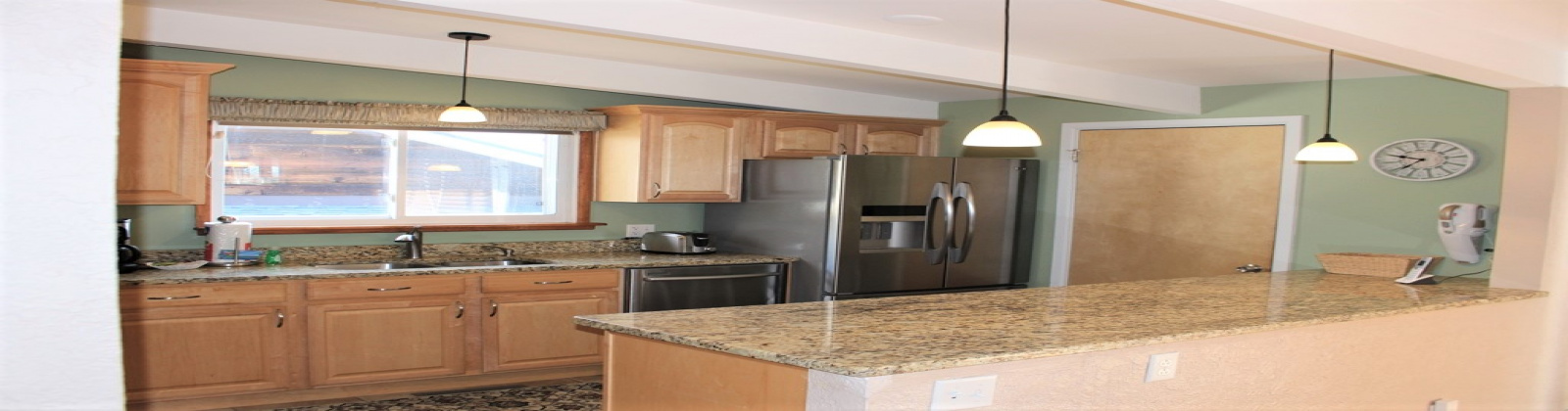 3 Bedroom 3 Bathroom property has amazing views of downtown Denver and is a stone\'s throw away from 6th Avenue. Hardwood floors are featured throughout the main floor, along with granite countertops, stainless steel appliances, enclosed office space, floor-to-ceiling windows, private outdoor space, raised deck, and 2-car detached garage.