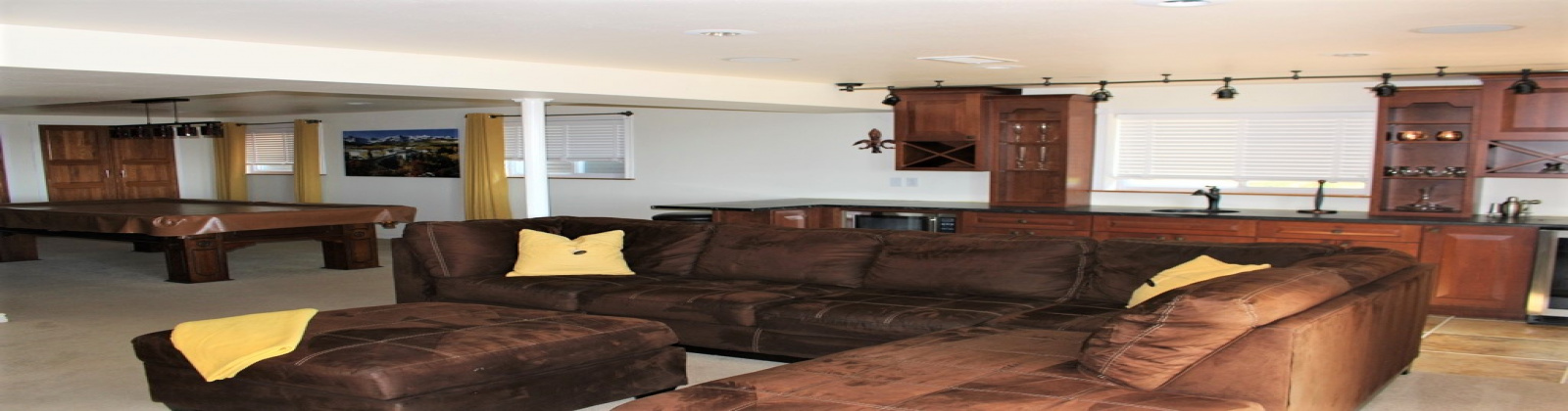 3 Bedroom 3 Bathroom property has amazing views of downtown Denver and is a stone\'s throw away from 6th Avenue. Hardwood floors are featured throughout the main floor, along with granite countertops, stainless steel appliances, enclosed office space, floor-to-ceiling windows, private outdoor space, raised deck, and 2-car detached garage.