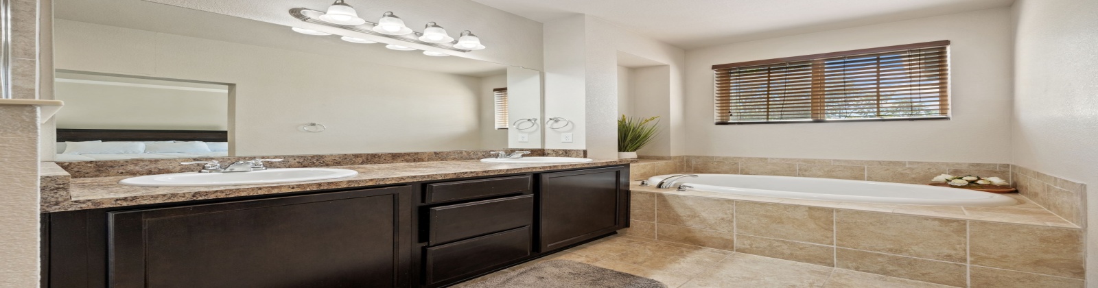 Welcome to this stylish and fully furnished townhome located in the highly desirable Park Meadows / Willow Creek area of Centennial. This south-facing home offers abundant natural light, modern finishes, and a layout designed for both comfort and convenience.
Interior Features
Main Level
•	Bright and open living room with fireplace, sofa seating, and wall-mounted TV.
•	Dining area with seating for six.
•	Chef’s kitchen featuring slab granite countertops, stainless steel appliances, and hardwood flooring.
•	Powder bath and direct access to the attached 2-car garage.
Upper Level
•	Primary Bedroom: King bed, walk-in closet, work desk, TV, and private balcony with seating.
•	Primary Bath: Dual vanities, soaking tub, and separate walk-in shower.
•	Second Bedroom: Queen bed and TV.
•	Third Bedroom: Large desk, shelving units, and a full-size futon (perfect as an office/flex space).
•	Secondary Bathroom: Large vanity with walk-in shower.
•	Laundry room conveniently located upstairs.
Outdoor & Community Highlights
•	Charming front patio with seating area.
•	Nearby there is a beautiful park with walking paths, pond, and fountain.
•	Walking distance to dining, shopping, and a nearby lake.
•	Just 0.5 miles to light rail & I-470, offering easy access across the Denver Metro area.
•	Quick drive to Park Meadows Mall, Lone Tree entertainment, and DTC.
Schools (Cherry Creek School District — all highly rated 9/10 by GreatSchools)
•	Willow Creek Elementary — 0.5 miles
•	Campus Middle School — 4.3 miles
•	Cherry Creek High School — 4.3 miles
