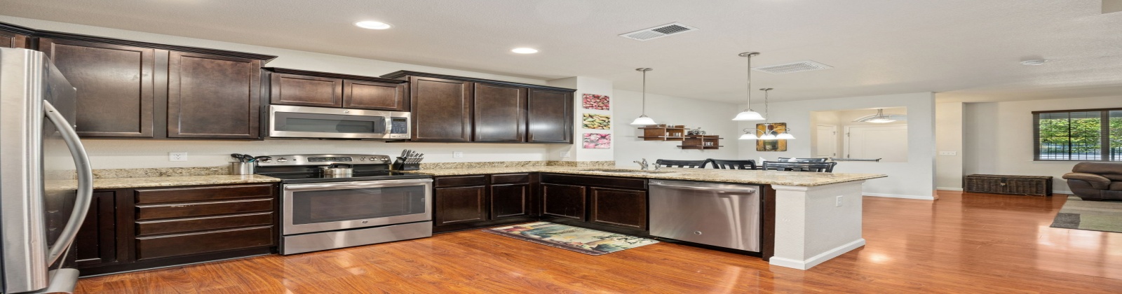 Welcome to this stylish and fully furnished townhome located in the highly desirable Park Meadows / Willow Creek area of Centennial. This south-facing home offers abundant natural light, modern finishes, and a layout designed for both comfort and convenience.
Interior Features
Main Level
•	Bright and open living room with fireplace, sofa seating, and wall-mounted TV.
•	Dining area with seating for six.
•	Chef’s kitchen featuring slab granite countertops, stainless steel appliances, and hardwood flooring.
•	Powder bath and direct access to the attached 2-car garage.
Upper Level
•	Primary Bedroom: King bed, walk-in closet, work desk, TV, and private balcony with seating.
•	Primary Bath: Dual vanities, soaking tub, and separate walk-in shower.
•	Second Bedroom: Queen bed and TV.
•	Third Bedroom: Large desk, shelving units, and a full-size futon (perfect as an office/flex space).
•	Secondary Bathroom: Large vanity with walk-in shower.
•	Laundry room conveniently located upstairs.
Outdoor & Community Highlights
•	Charming front patio with seating area.
•	Nearby there is a beautiful park with walking paths, pond, and fountain.
•	Walking distance to dining, shopping, and a nearby lake.
•	Just 0.5 miles to light rail & I-470, offering easy access across the Denver Metro area.
•	Quick drive to Park Meadows Mall, Lone Tree entertainment, and DTC.
Schools (Cherry Creek School District — all highly rated 9/10 by GreatSchools)
•	Willow Creek Elementary — 0.5 miles
•	Campus Middle School — 4.3 miles
•	Cherry Creek High School — 4.3 miles
