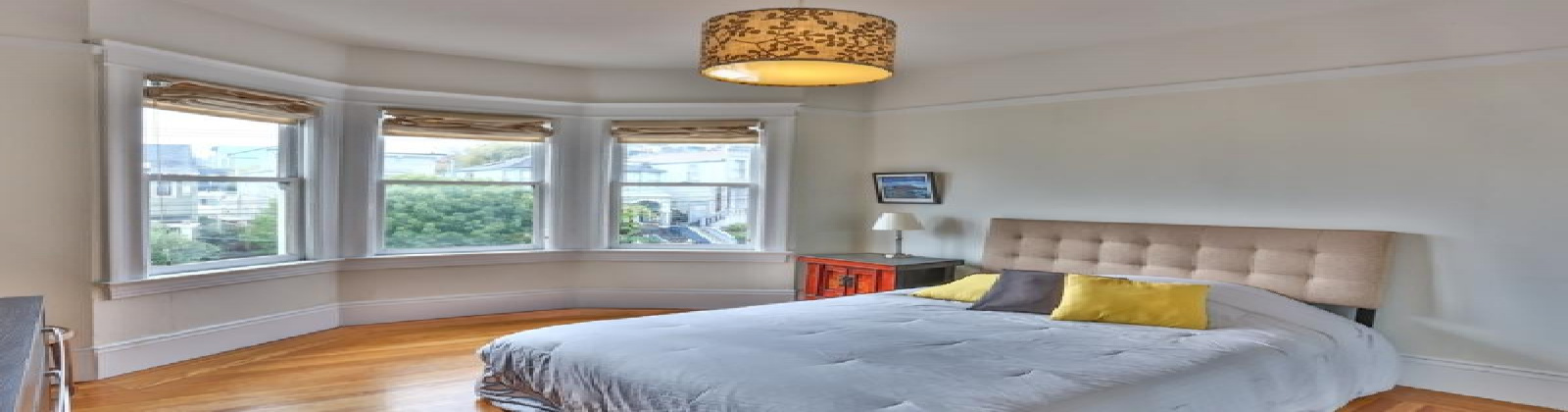 2 Bedroom and 2 Bathroom flat in Noe Valley. Features: elegant textured moldings reminiscent of turn-of-the century design, work desk, pull-out sofa, mirrored closets, walk-in closets, stool seating at the kitchen island, clawfoot bathtub, large outdoor wooden deck with views, and view of the Twin Peaks mountain to the west. This is an upper floor unit. There is no assigned parking with the property, but street parking is not difficult as there are no time restrictions.

Short walk to the vibrant commercial corridor of 24th Street featuring a Whole Foods market, boutiques, bars, Starbucks and Zagat rated restaurants. Corporate shuttles are within walking distance.