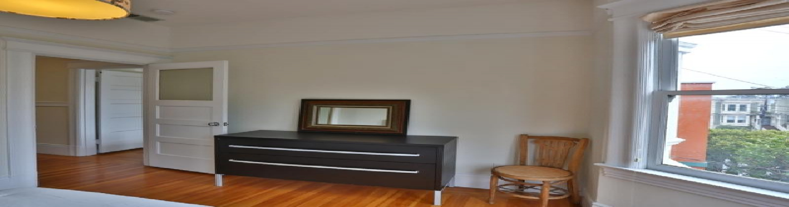 2 Bedroom and 2 Bathroom flat in Noe Valley. Features: elegant textured moldings reminiscent of turn-of-the century design, work desk, pull-out sofa, mirrored closets, walk-in closets, stool seating at the kitchen island, clawfoot bathtub, large outdoor wooden deck with views, and view of the Twin Peaks mountain to the west. This is an upper floor unit. There is no assigned parking with the property, but street parking is not difficult as there are no time restrictions.

Short walk to the vibrant commercial corridor of 24th Street featuring a Whole Foods market, boutiques, bars, Starbucks and Zagat rated restaurants. Corporate shuttles are within walking distance.