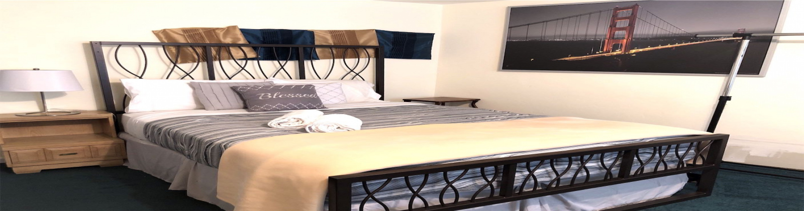 3 Bedroom/2 Bathroom mid-century single family house is located in Noe Valley. Features: desk, original chandelier, original art-deco lines in the crown molding trims and arched doorways, bathtub features extra length (for bath soaks), deep closets, downtown skyline views, original kitchen tiling and cabinets, portable dishwasher, and a large bonus room. The King bed in the lower bedroom can be separated into two twin beds. The house has a deep 2-car attached garage that will fit 2 smaller vehicles with tandem parking.  Washer and dryer are in the garage.  This pet-friendly property also has a quaint zen garden like backyard area that is totally fenced in.

Easy access to commuter shuttles and public transportation. Near the 24th Street commercial corridor and a small climb to the Diamond Heights shopping center for a variety of shops to include Safeway, Walgreens and a Chinese dim sum restaurant.

 

 